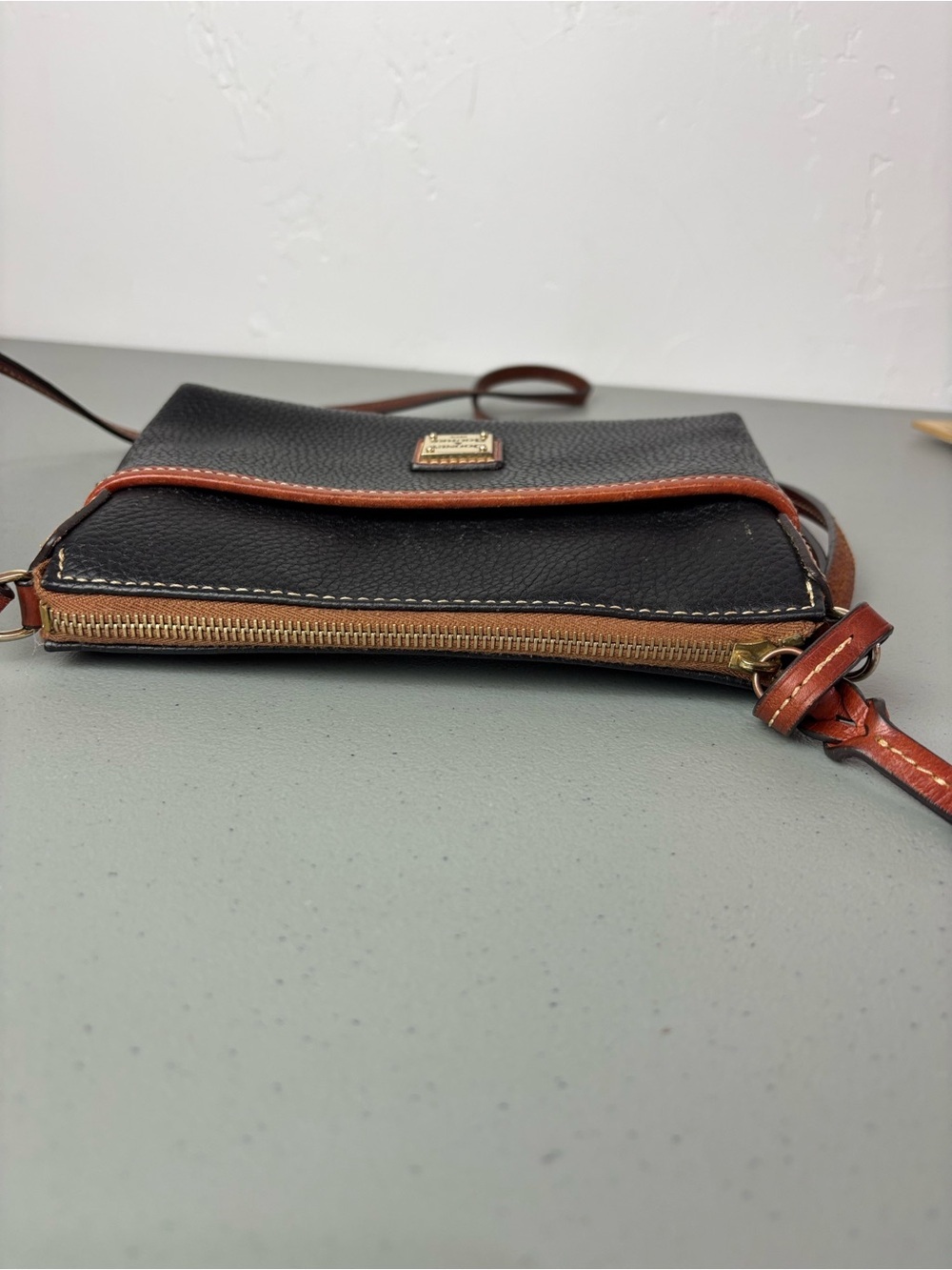 Dooney & Bourke Black Pebble Leather Crossbody with Brown Trim Zip Closure - Picture 5 of 14